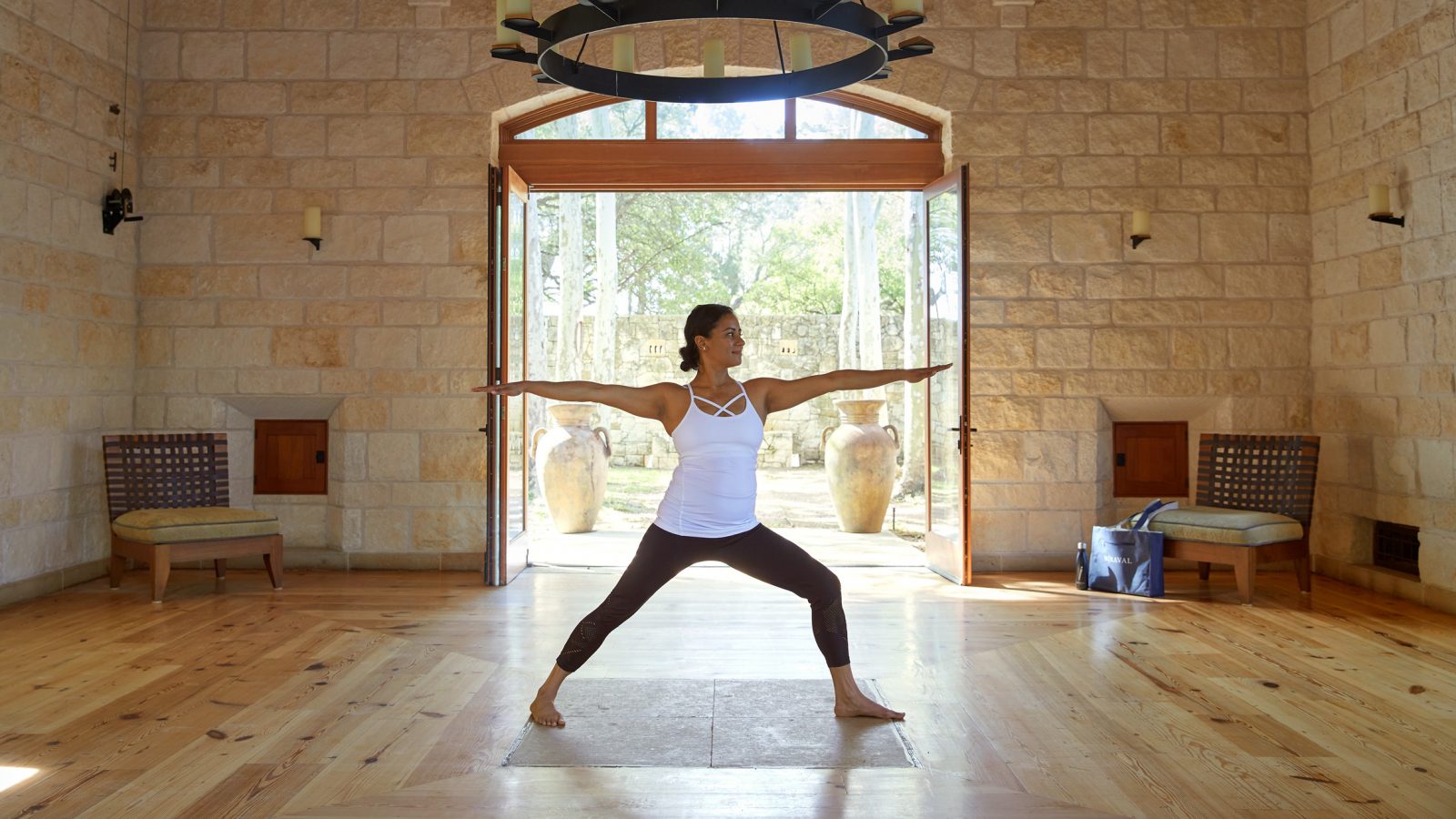 person doing yoga pose inside