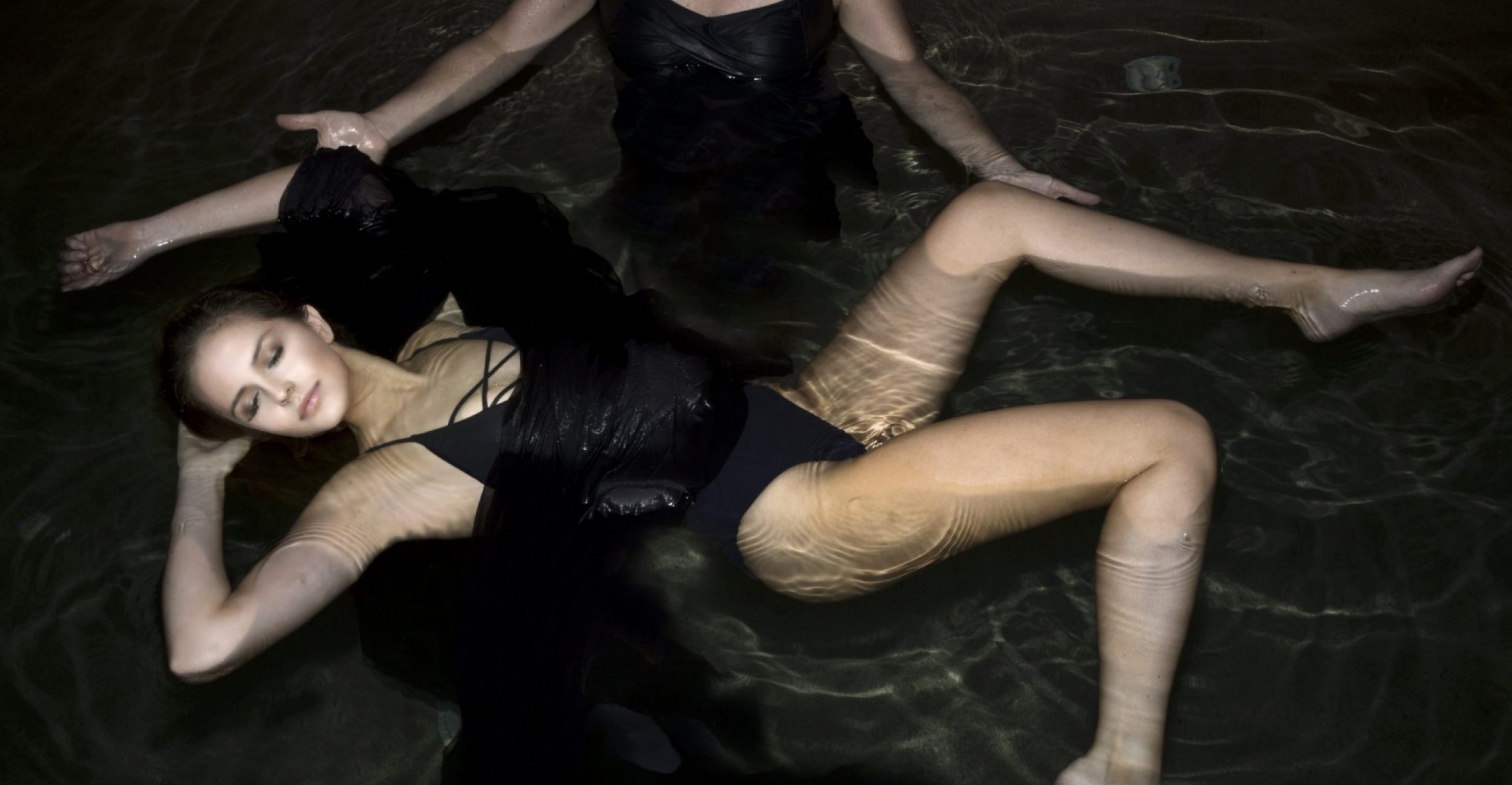 person relaxing in water