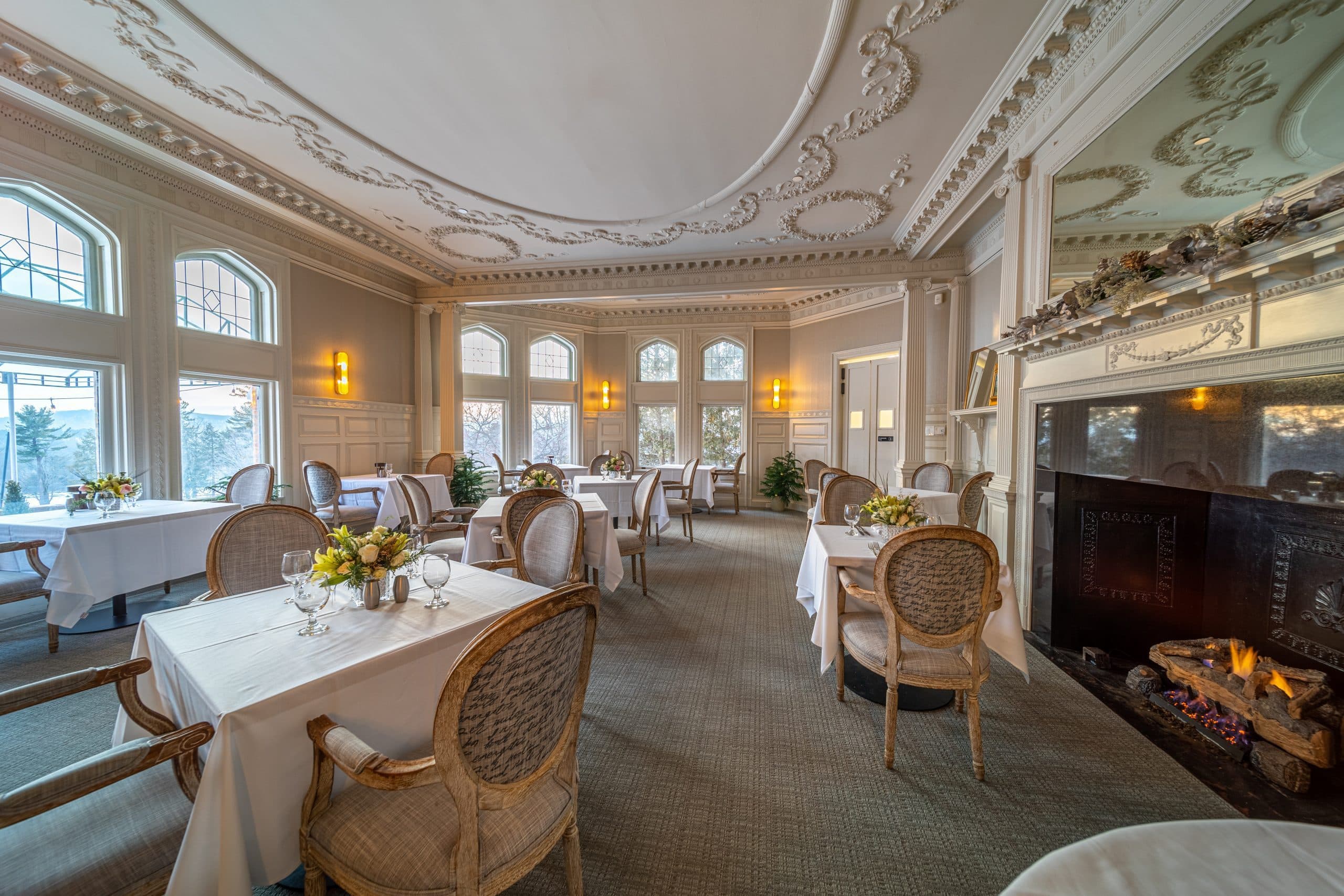 Antique dining room with fireplace at mansion